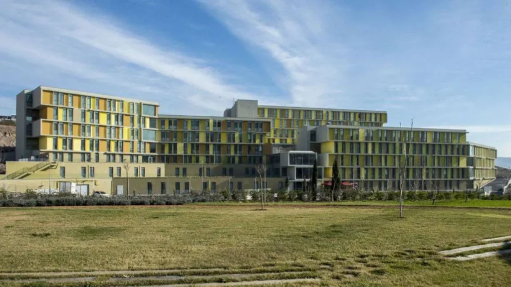 External view of the Özyeğin University Faculty of Applied Sciences campus building.